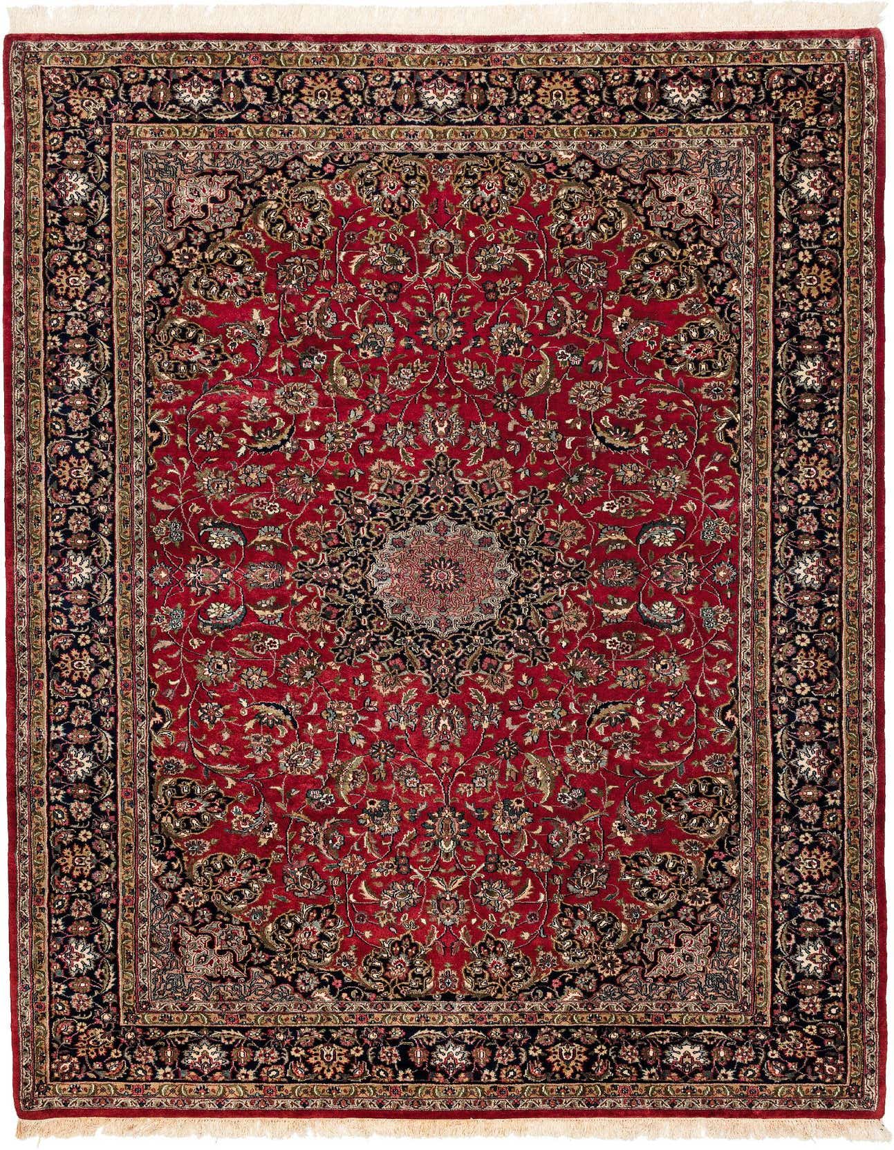 A 7x10 rectangular Isfahan rug featuring a rich red field with a central medallion and intricate floral patterns, framed by a dark border.