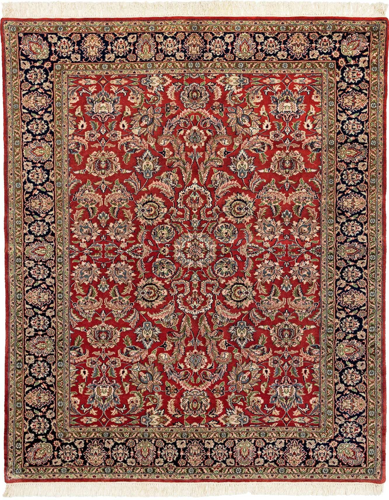 A 5x8 rectangular Isfahan rug featuring a rich red field with an intricate floral pattern and a dark navy border.