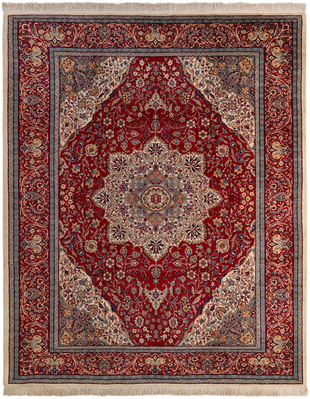 A 7x10 rectangular Isfahan rug featuring a detailed red and cream traditional medallion pattern with intricate floral motifs, ideal for a living room.