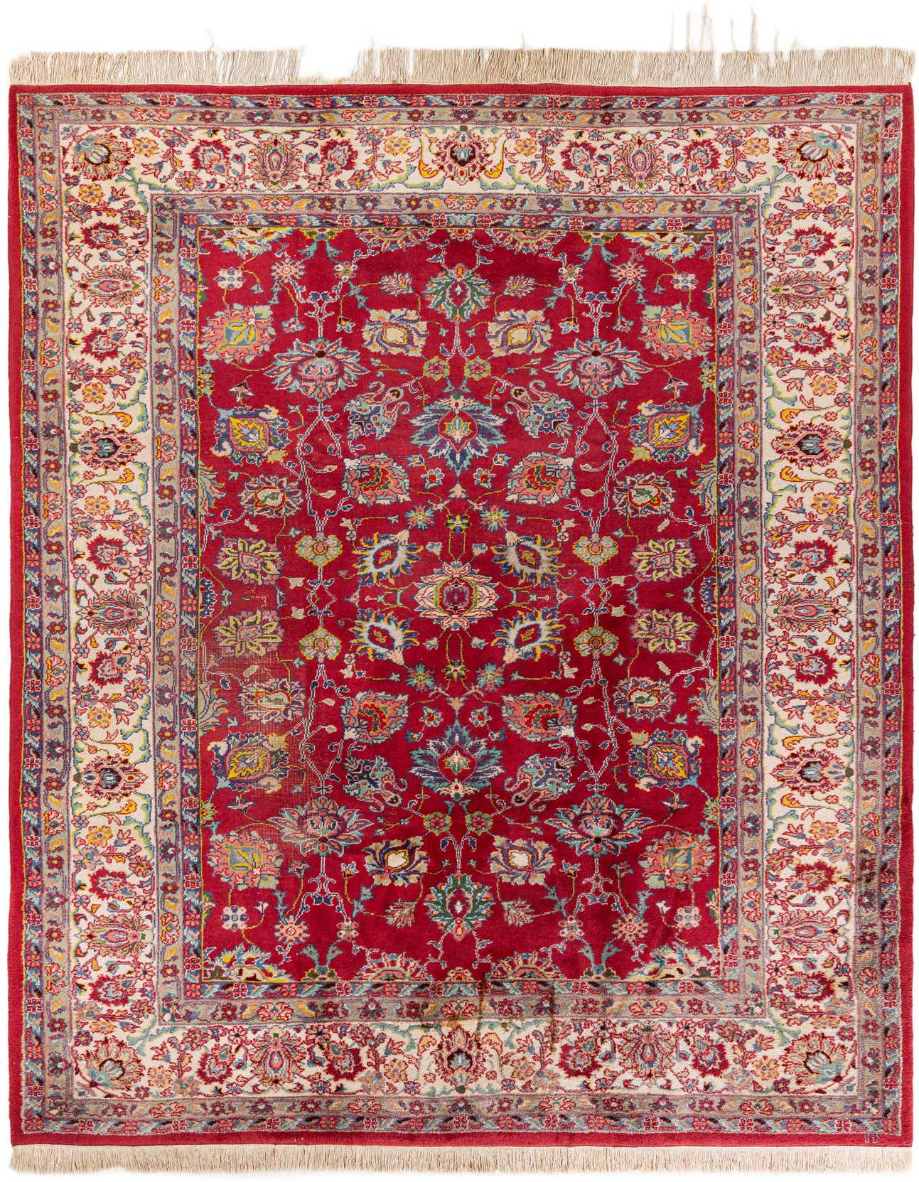 A vibrant 8x11 rectangular Isfahan rug featuring a rich red field with intricate floral patterns and a detailed cream border, ideal for a living room.