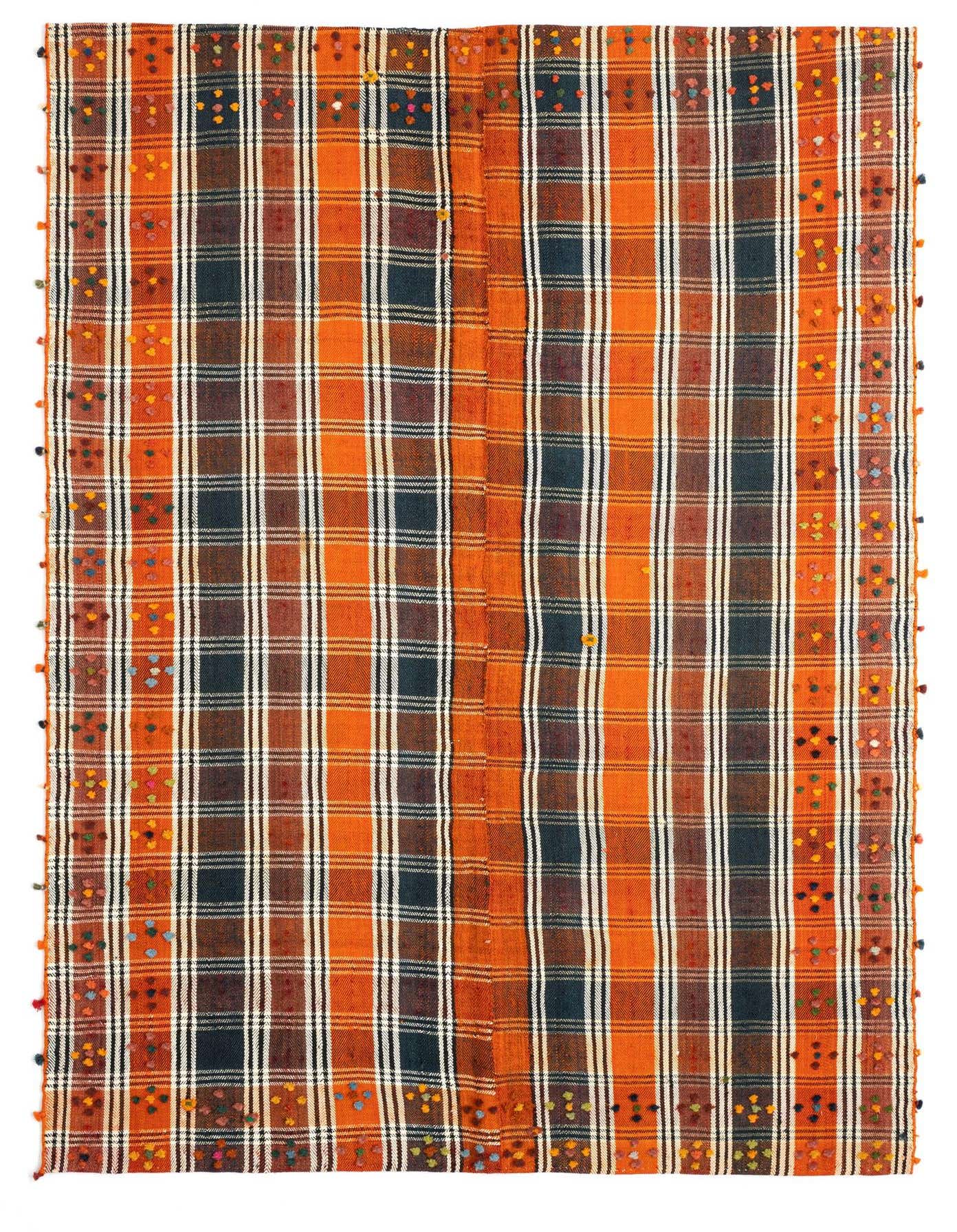 A 4x6 rectangular Jajim rug in a vibrant red and black plaid pattern with colorful pom-pom details.