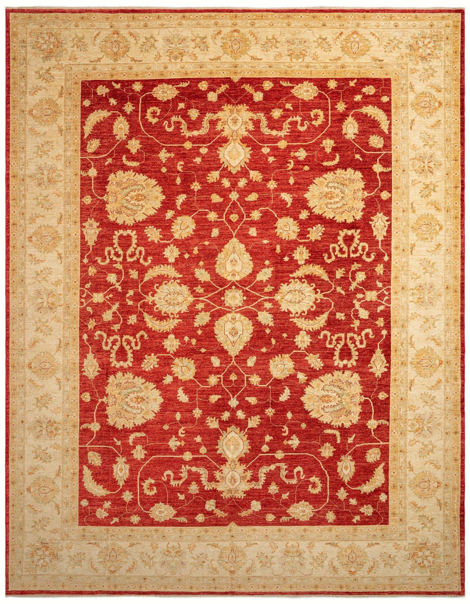 A 10x13 rectangular Kaizar Persian rug in rich red with intricate cream and gold floral patterns and a wide decorative border.
