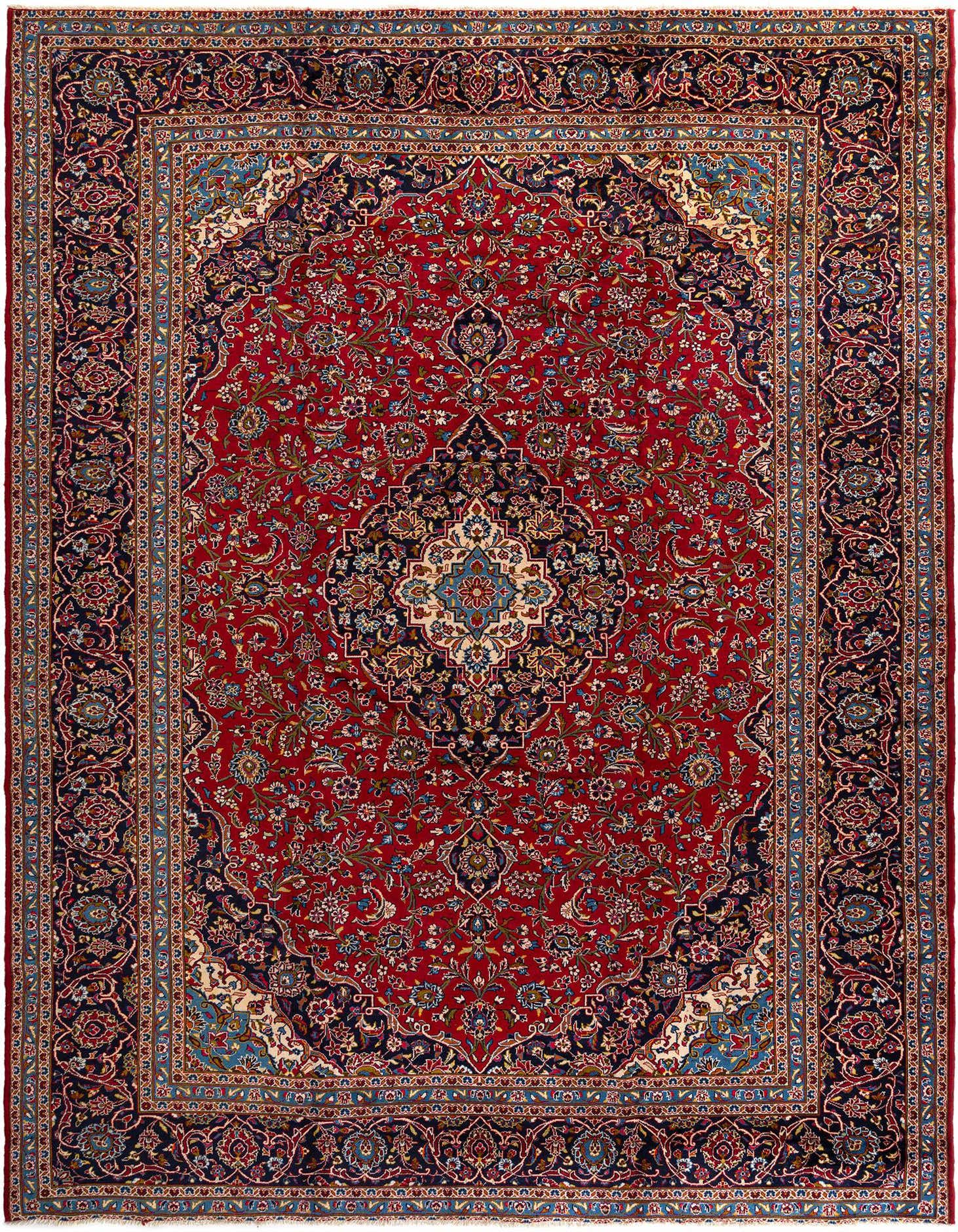 A 10x13 rectangular Persian rug in rich red with an intricate floral medallion pattern and a dark blue border.