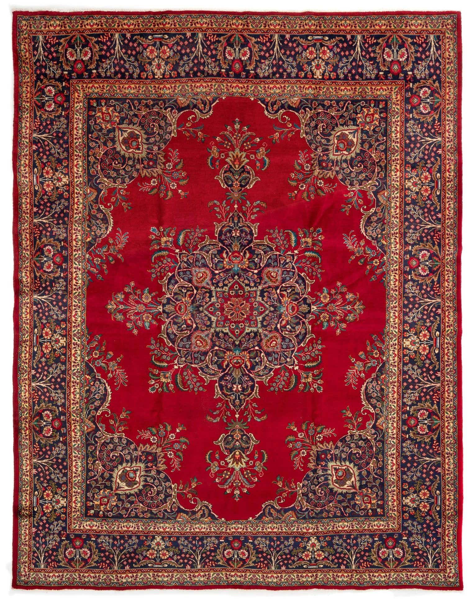 A large 10x13 rectangular red Persian rug with an intricate blue and gold floral medallion and border.