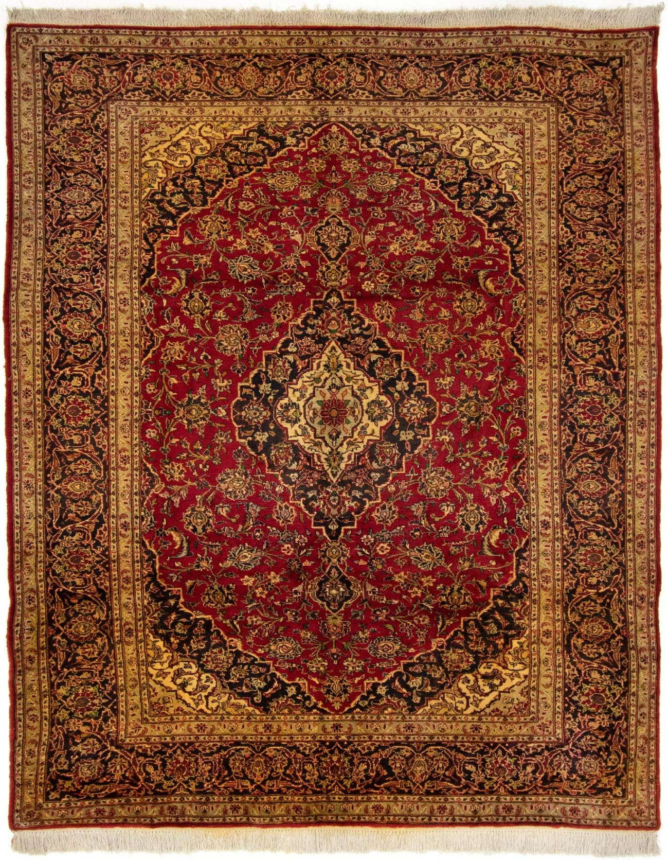 A rectangular 7x10 red Persian area rug with intricate black and gold floral patterns and a central medallion.