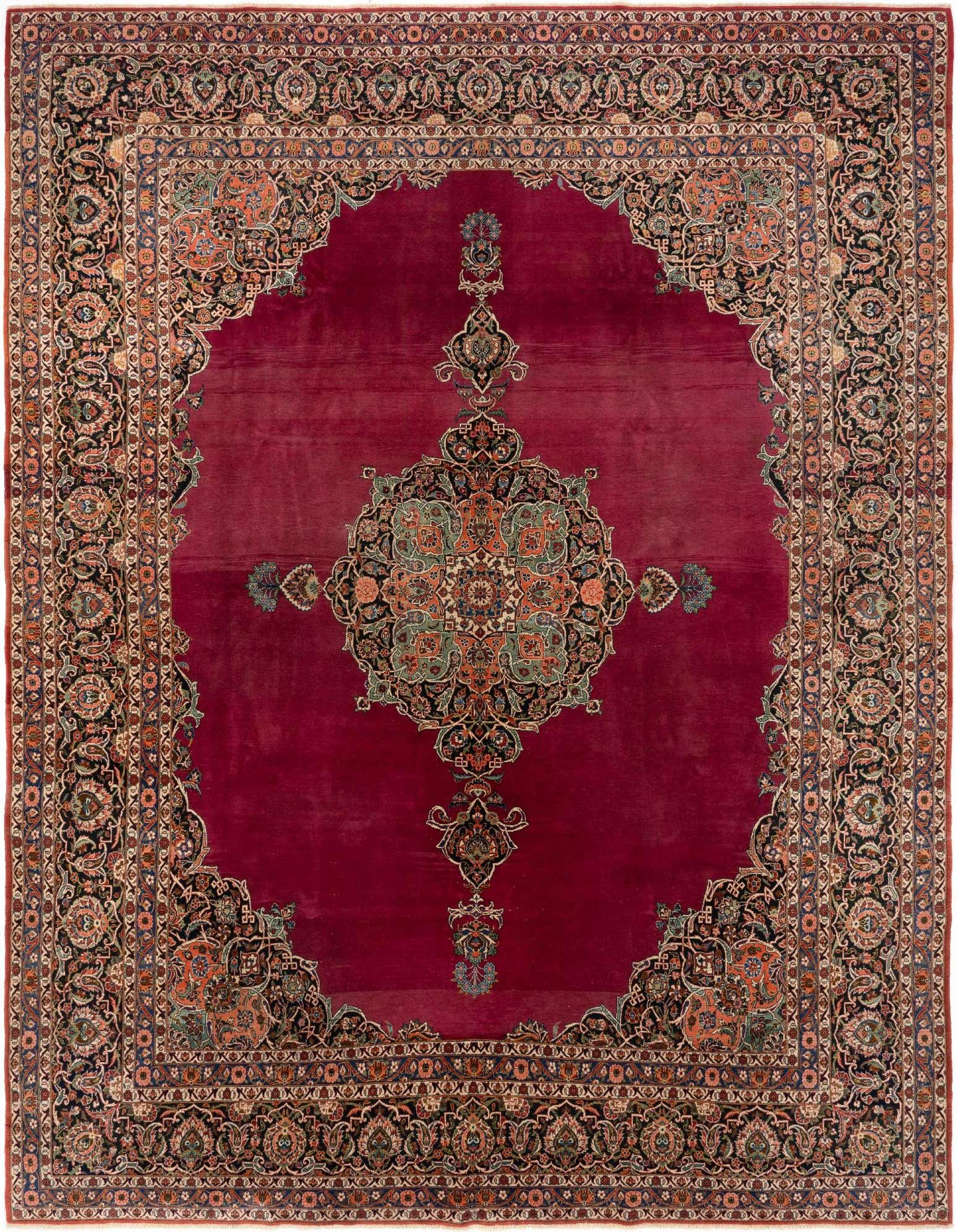 A 10x14 rectangular Kashan Persian rug featuring a rich red field with an intricate black and multi-colored floral medallion and border.