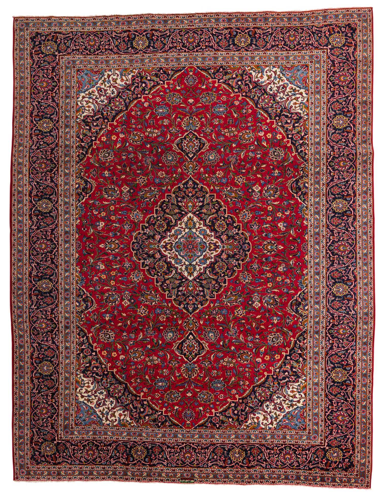 A large 10x13 rectangular red Persian wool rug with an intricate traditional medallion pattern and dark blue border.