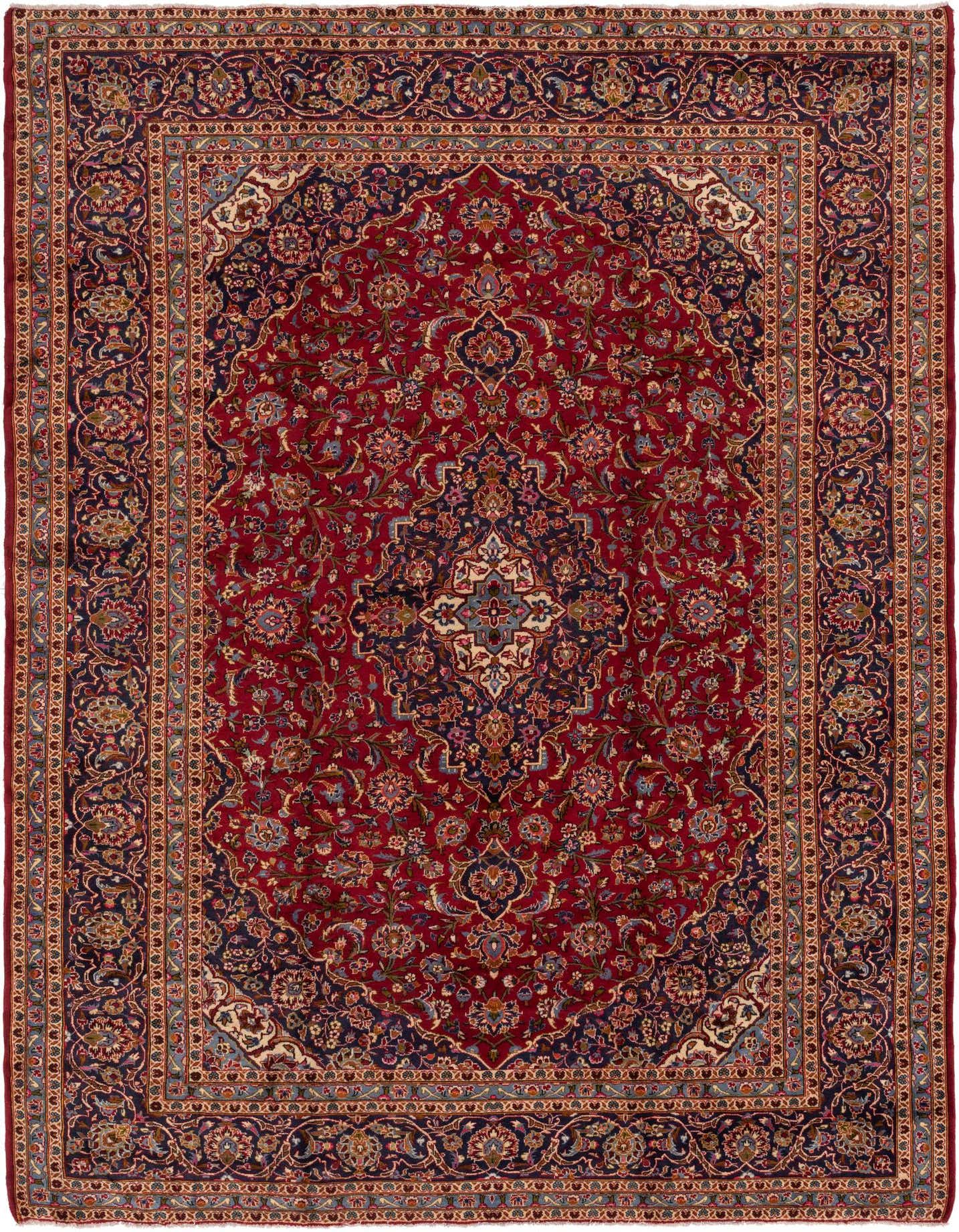 A 10x13 rectangular red Persian rug with an intricate navy blue medallion and botanical patterns, ideal for a living room.