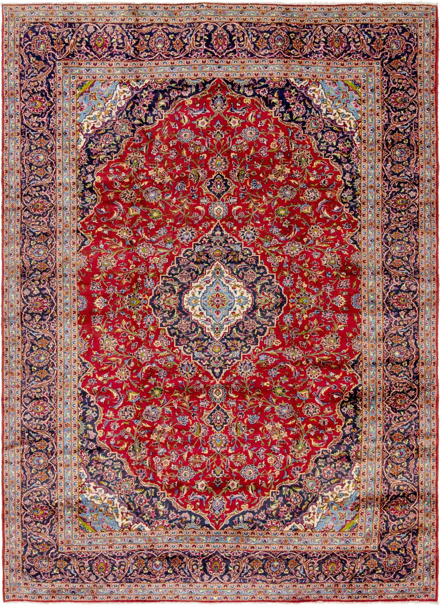 A 10x13 rectangular red Persian rug with a central medallion and intricate floral patterns, framed by a dark blue border.