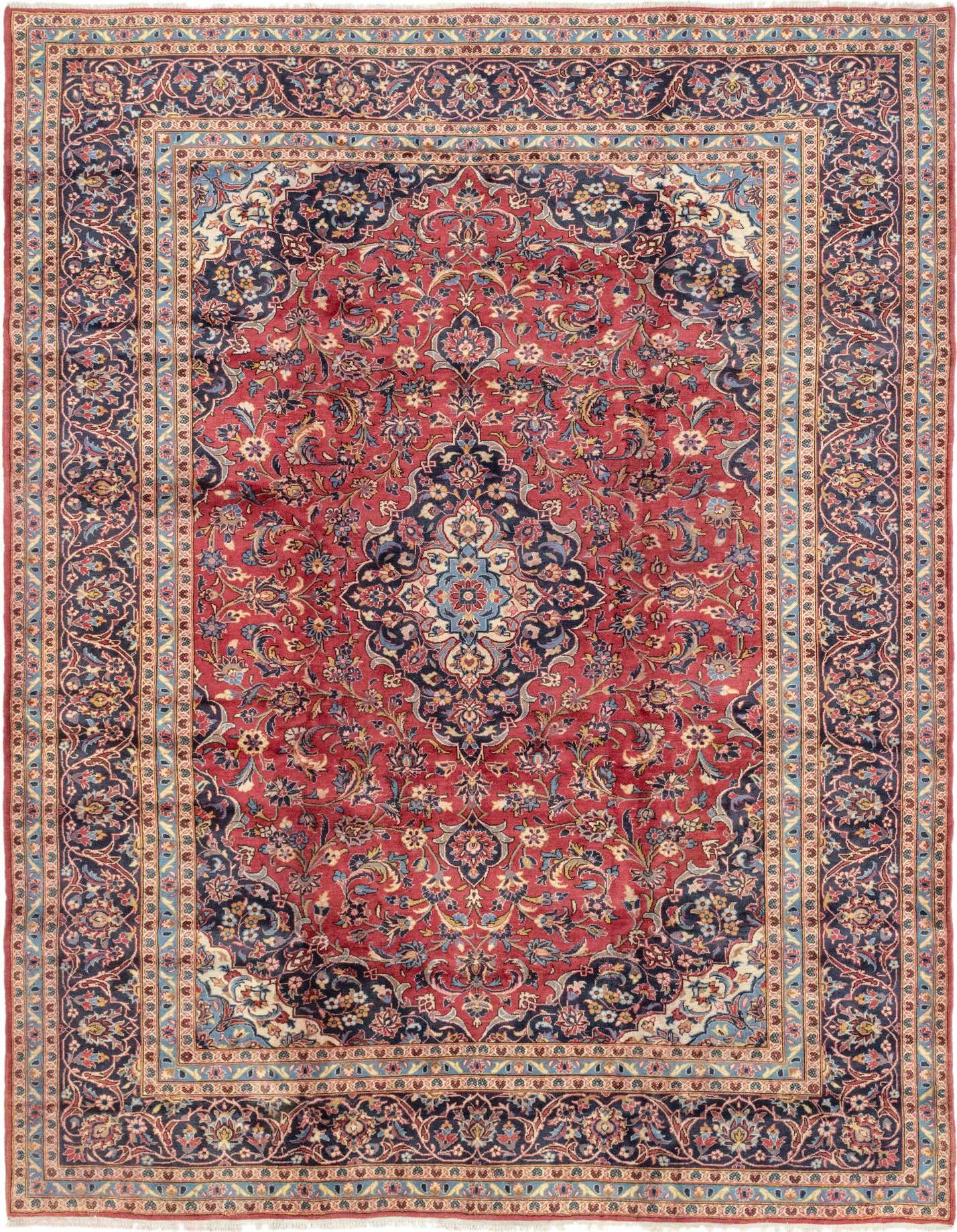 A 10x13 rectangular red Persian wool rug with a central medallion and intricate botanical patterns in navy, blue, and cream.
