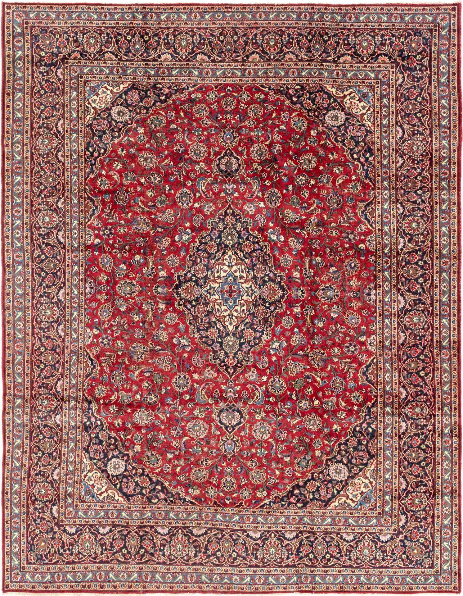 A 10x13 rectangular Kashan rug featuring a rich red field with intricate botanical and medallion patterns in blues and creams, surrounded by a detailed traditional border.