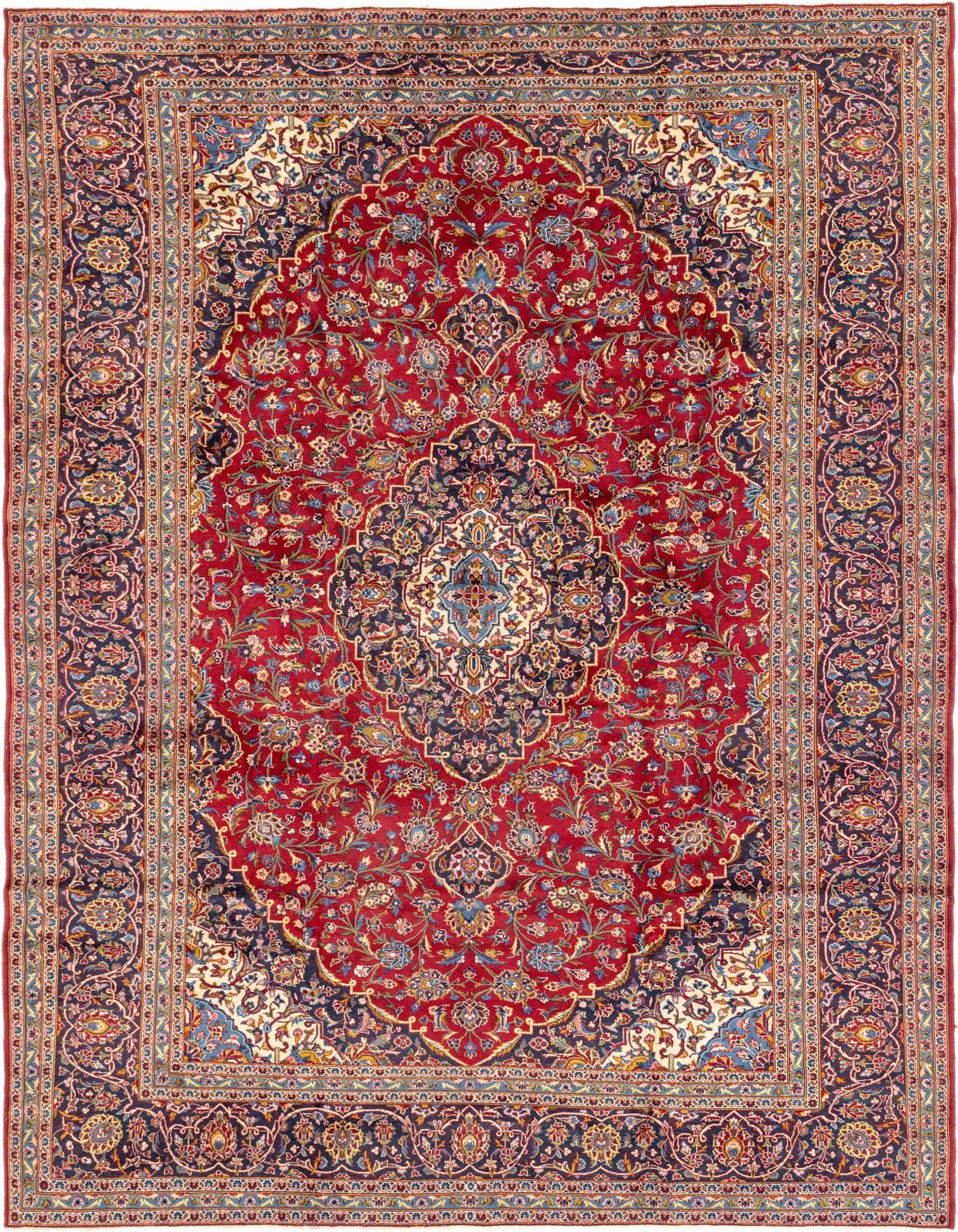 A 10x13 rectangular red Persian wool rug with a central medallion and intricate botanical patterns.
