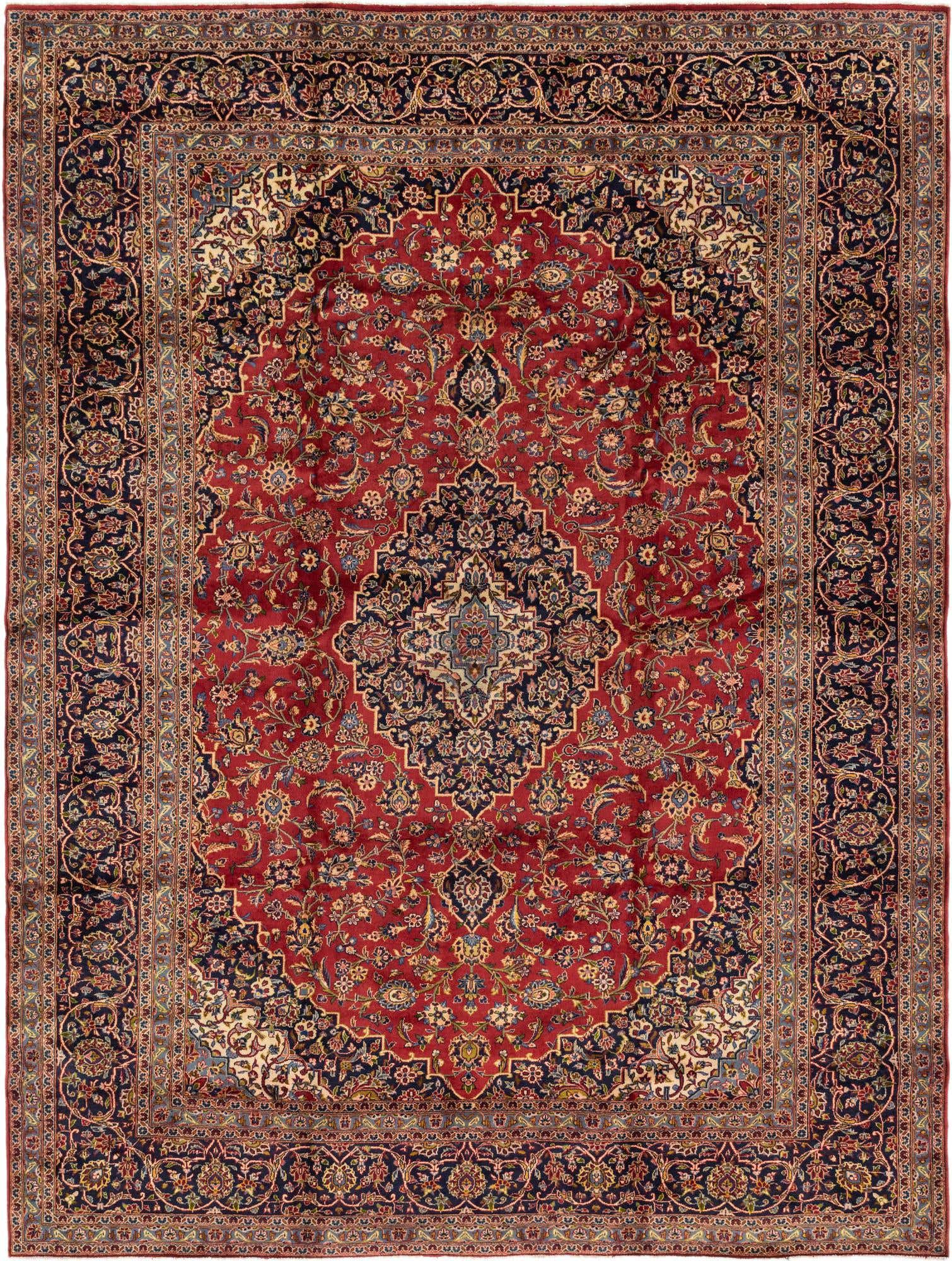 A 10x13 rectangular traditional Persian wool rug featuring a red field with an intricate botanical medallion and a dark blue border.