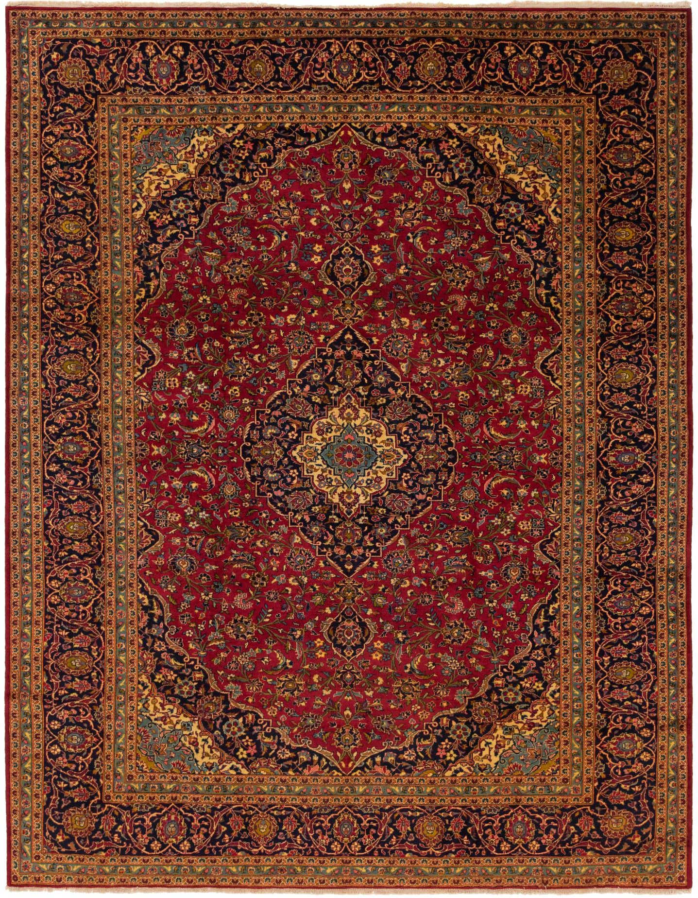 A large 10x13 rectangular red Persian rug with an intricate traditional medallion pattern and dark blue borders, handmade from wool.