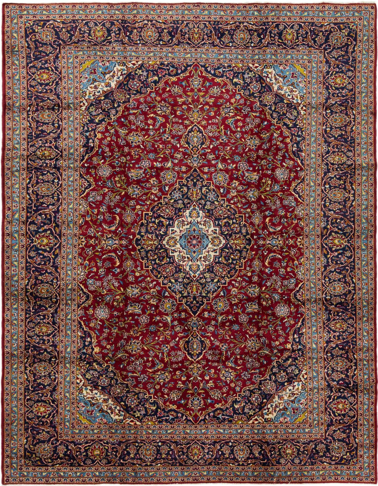 A 10x13 rectangular Persian rug featuring a central medallion and intricate floral patterns in deep reds and navy blue.