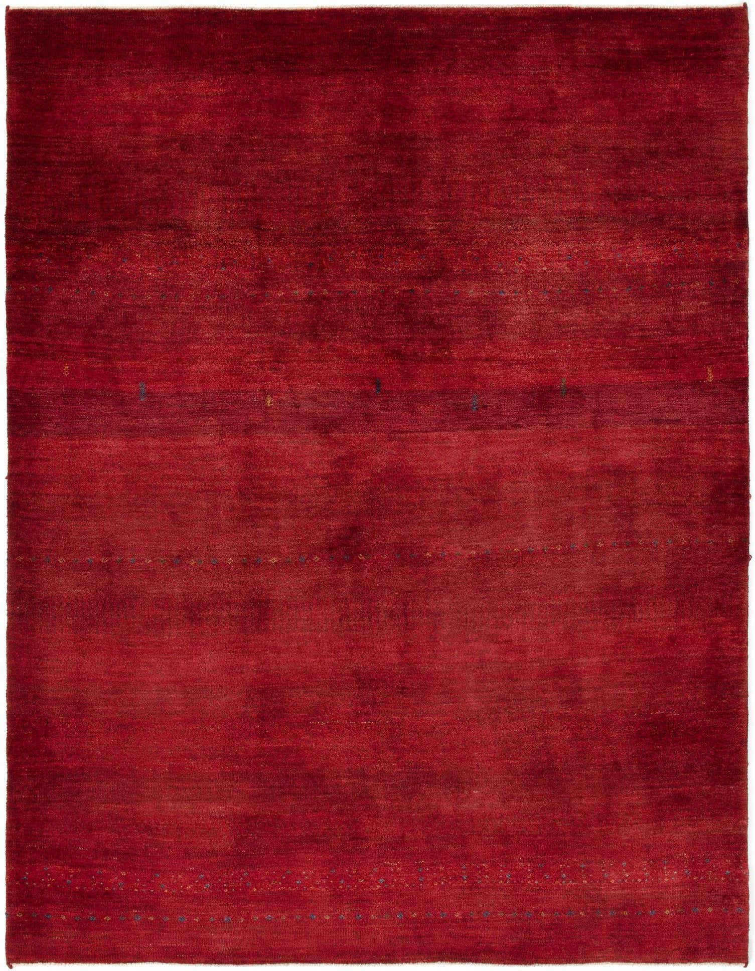 A 4x6 rectangular Rugs.com Kashkuli wool rug in a rich, solid red hue with subtle variations.