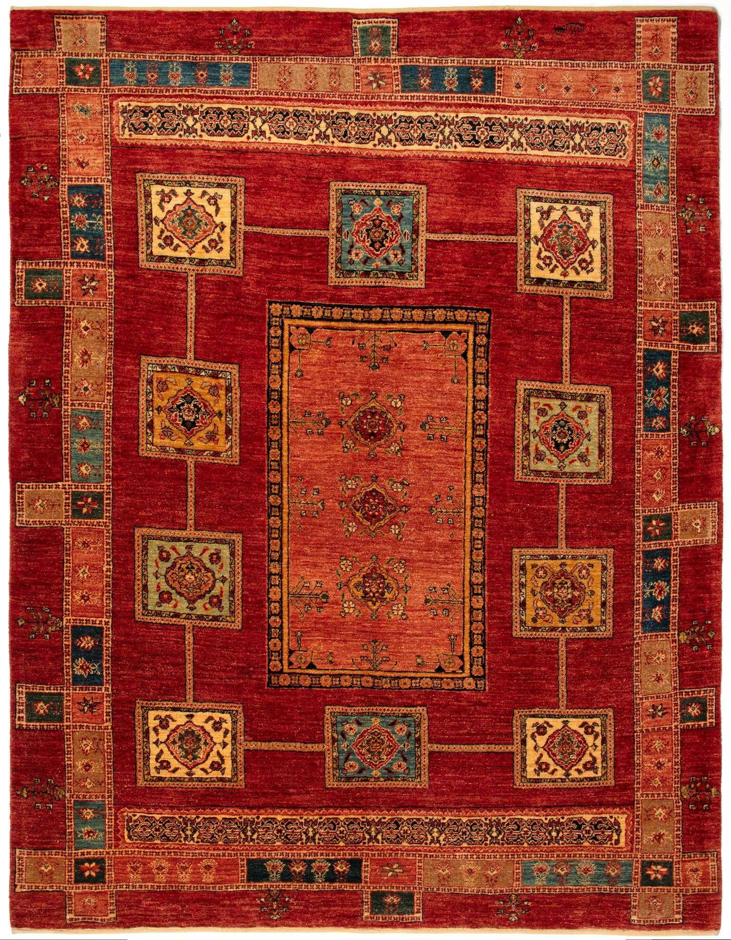 A 5x8 rectangular Kashkuli Persian rug in rich reds, featuring a central medallion and ornate square motifs.