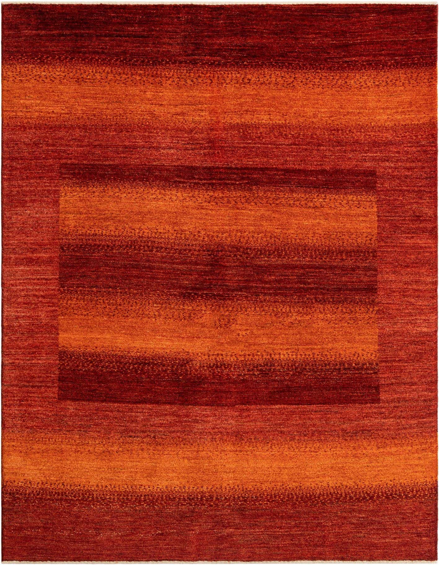 A 4x6 rectangular wool rug in varying shades of red and orange, featuring a subtle striped pattern and a darker red border.