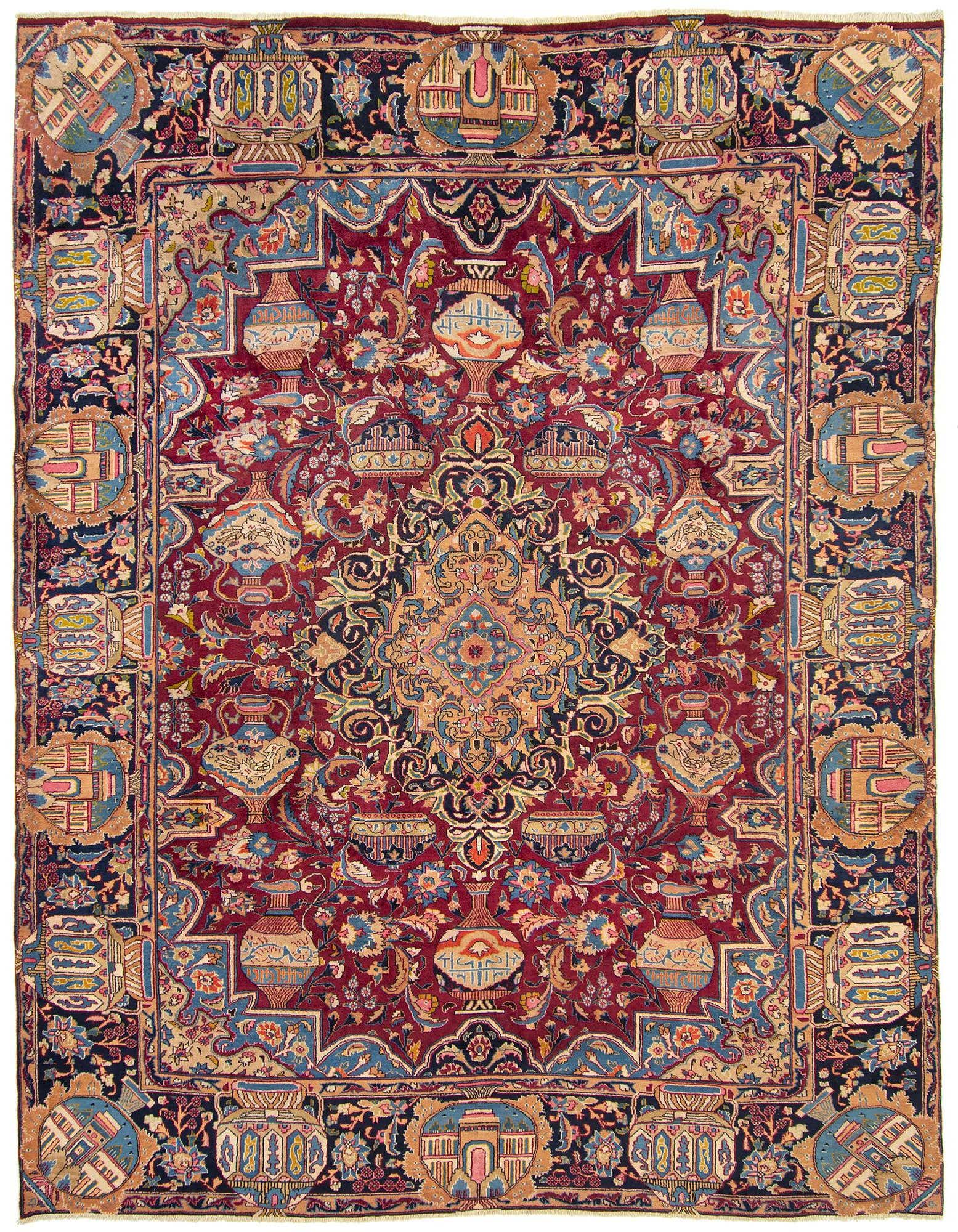 A rectangular 10x13 Persian Kashmar wool rug featuring a rich red field with intricate floral and vase motifs, surrounded by a dark blue border with ornate patterns.