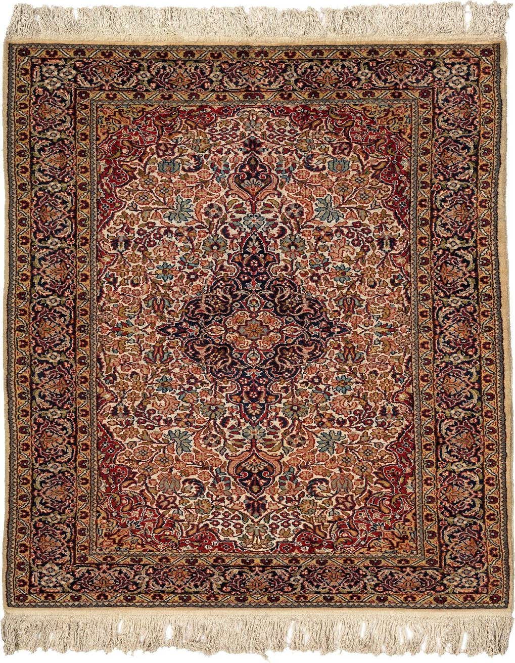 A 3x5 rectangular Kashmir rug in reds, featuring intricate traditional floral patterns and a central medallion, with fringed ends.