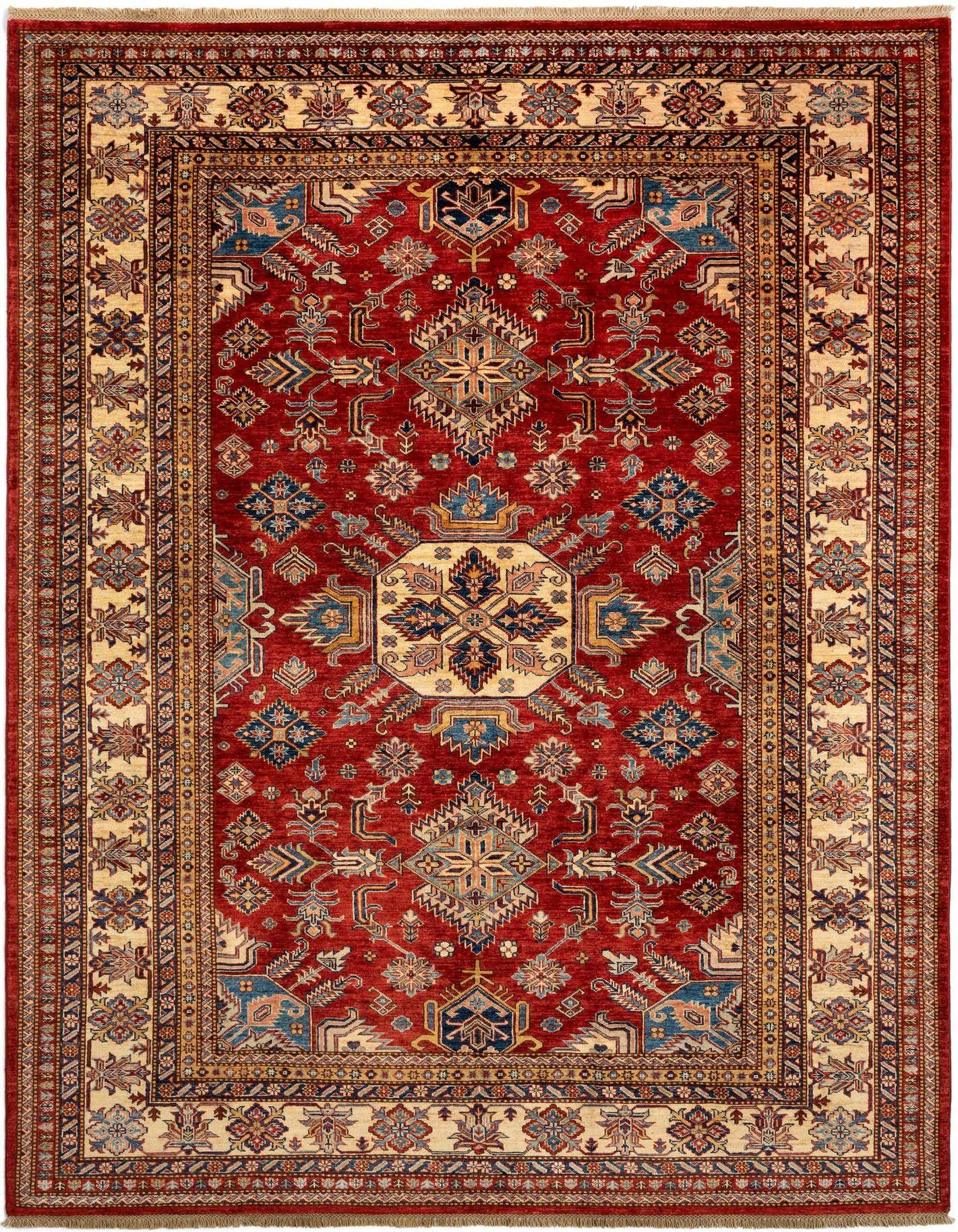 A 7x10 rectangular red Persian wool rug with intricate geometric patterns in blue, gold, and cream, ideal for a living room.