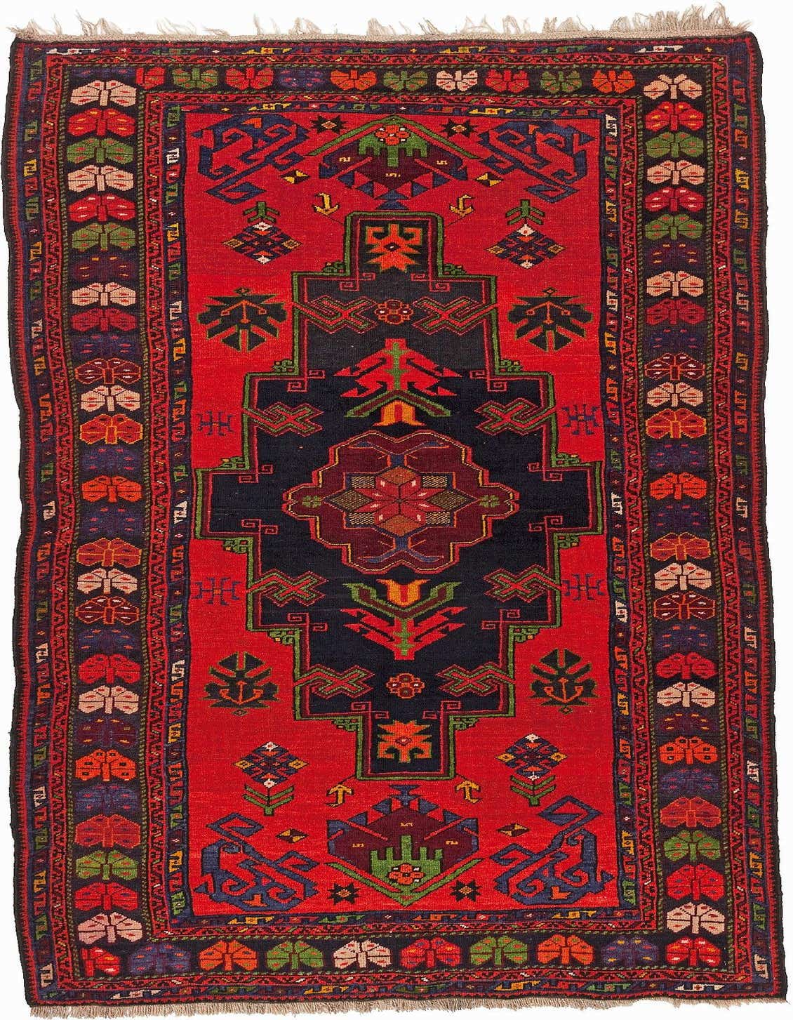 A 4x6 rectangular red Kazak wool rug with a dark navy central medallion and intricate geometric patterns in green, orange, and blue.