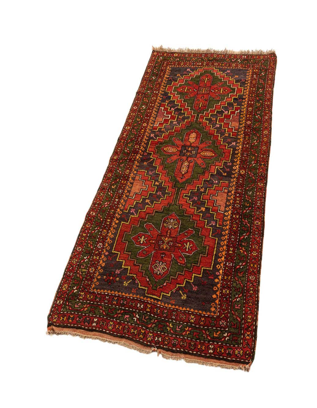 A 4x6 rectangular handmade Kazak rug with a traditional geometric pattern in reds, greens, and dark blue.