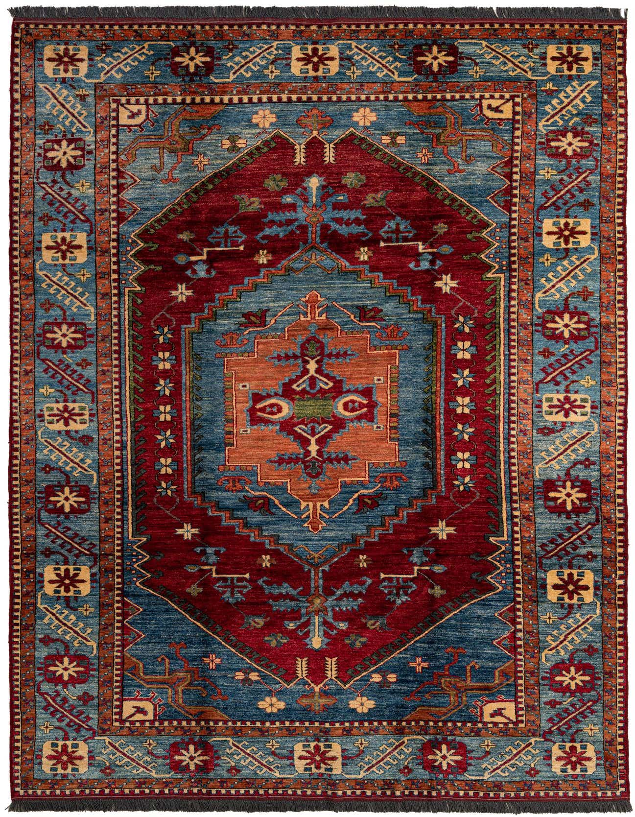 A 7x10 rectangular Rugs.com Kazak rug with a central medallion, featuring traditional Oriental patterns in deep reds, blues, and gold.