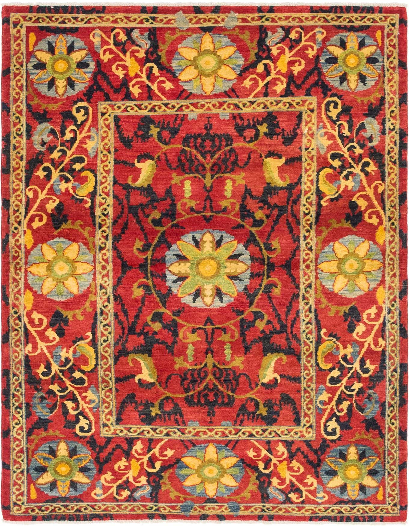 A 4x6 rectangular red wool rug with a traditional tribal medallion pattern and intricate floral borders.
