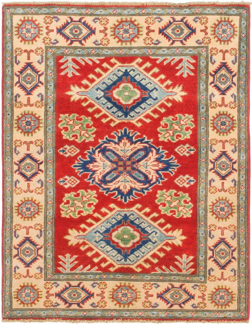 A 3x4 rectangular Rugs.com Kazak rug with a red field, featuring a central medallion and geometric patterns in blue, green, and cream, framed by a cream border with tribal motifs.