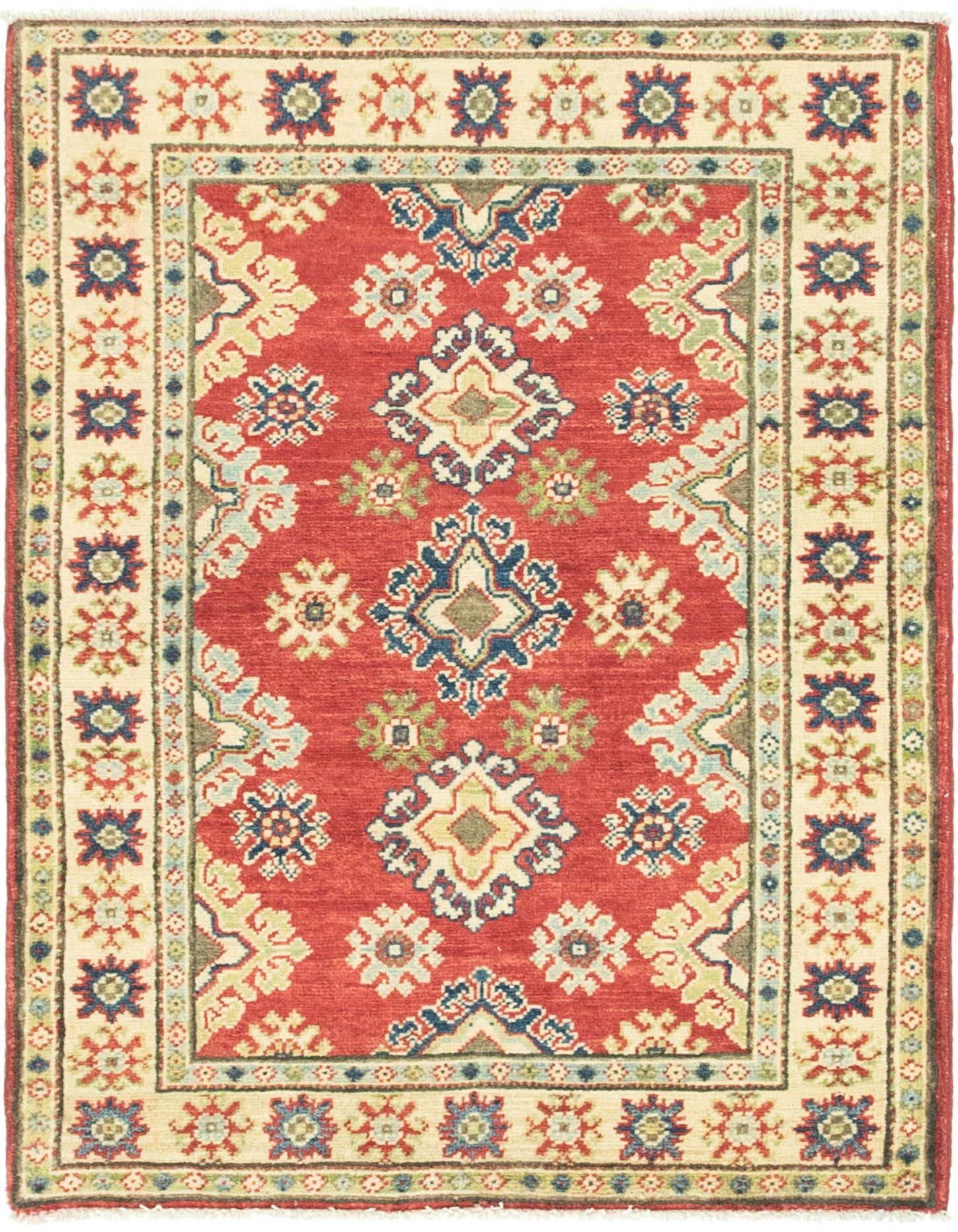 A 3x4 rectangular Rugs.com Kazak rug with a red field and traditional Southwestern motifs in blue, green, and cream, framed by a cream border.
