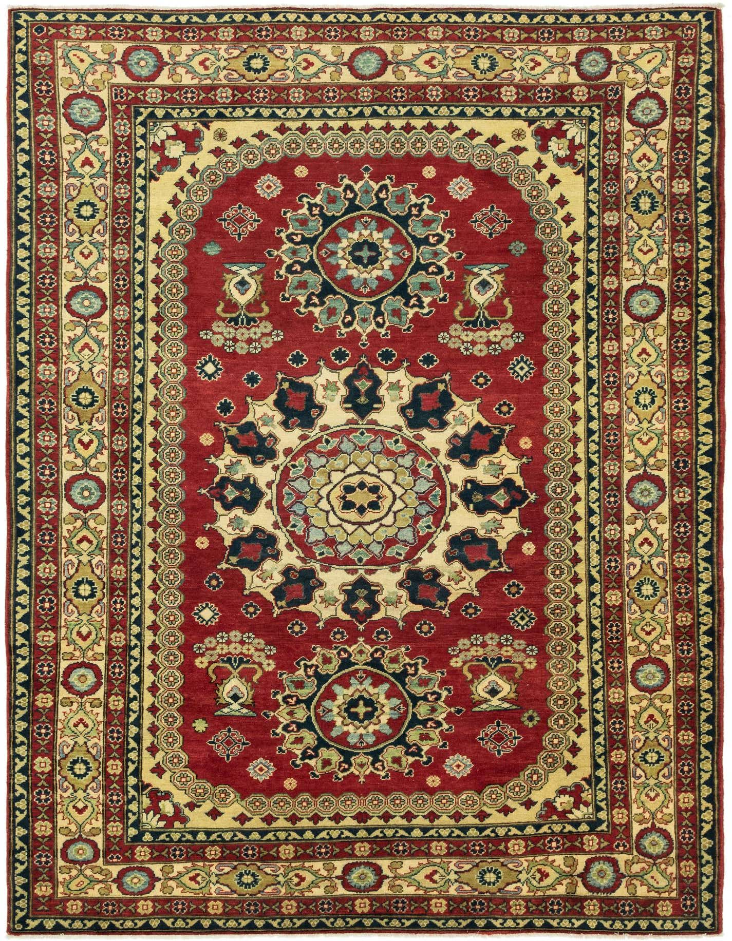 A 7x10 rectangular red traditional rug with a central medallion and intricate floral and geometric patterns in cream, blue, and green.