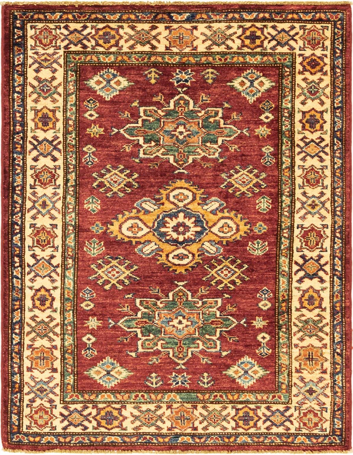 A 3x4 rectangular red traditional rug with intricate tribal patterns and a cream border, made of hand-spun wool.