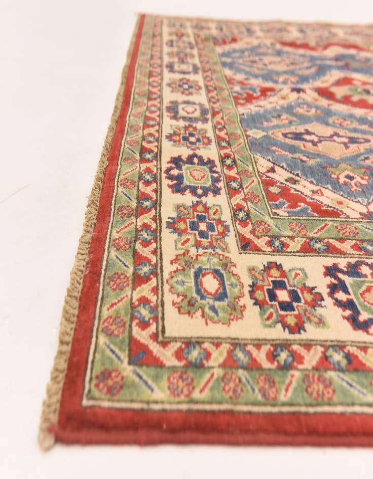 Detail image of  6' x 9'  Hand Knotted Kazak Rug