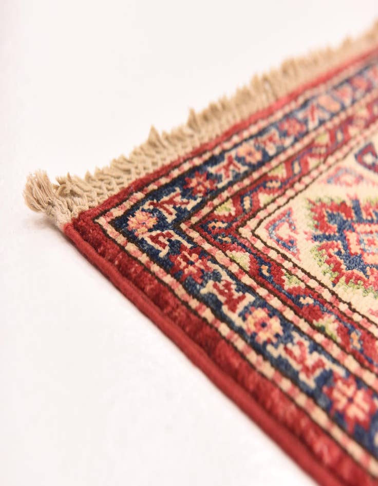 Detail image of  4' 11 x 6' 7  Hand Knotted Kazak Oriental Rug