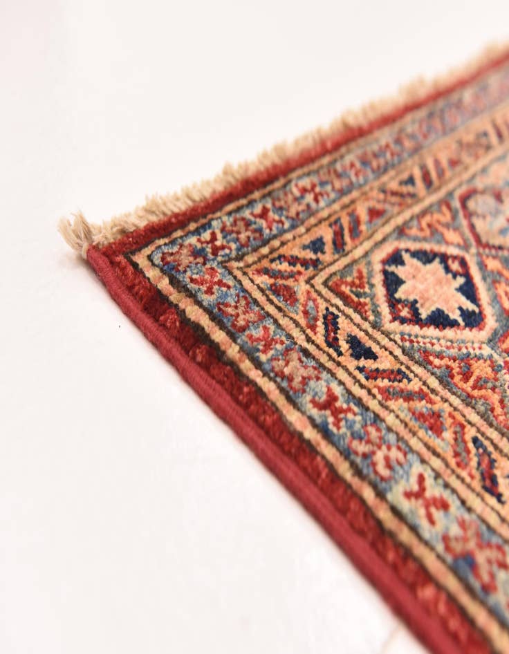 Detail image of  4' 11 x 6' 7  Hand Knotted Kazak Oriental Rug