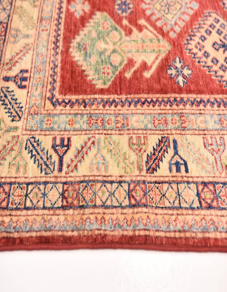 Detail image of  4' 10 x 6' 7  Hand Knotted Kazak Oriental Rug