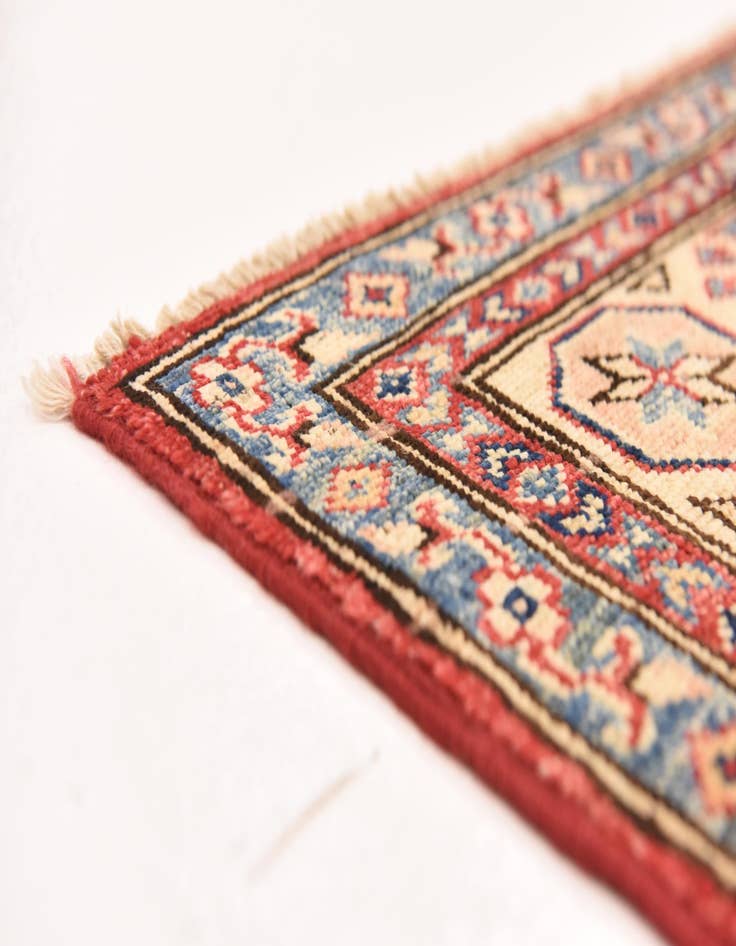 Detail image of  4' 11 x 6' 6  Hand Knotted Kazak Oriental Rug
