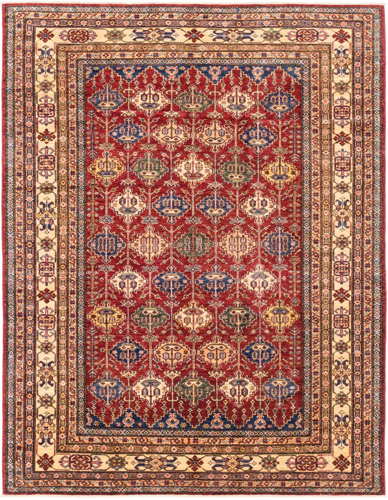 A 7x10 rectangular Rugs.com Kazak rug with a deep red field and intricate traditional patterns in blue, gold, and cream, featuring a detailed border.