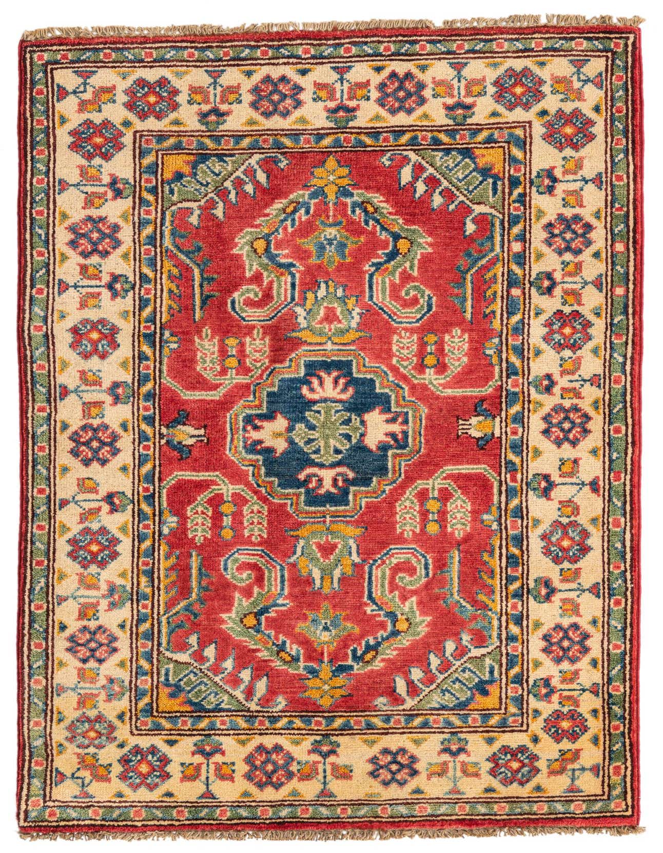 A 3x4 rectangular red Kazak rug with a central medallion and intricate traditional patterns in blue, green, and yellow on a cream border.