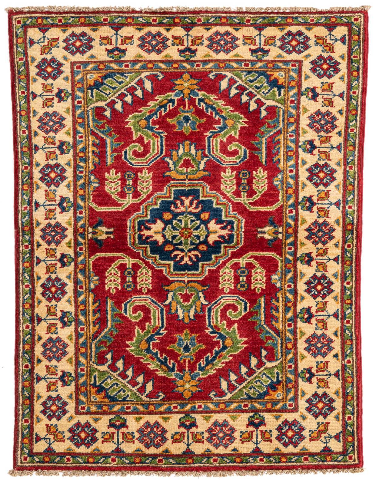 A 3x4 rectangular red Kazak rug with a central medallion, intricate traditional patterns in blue, green, and gold, and a cream border.