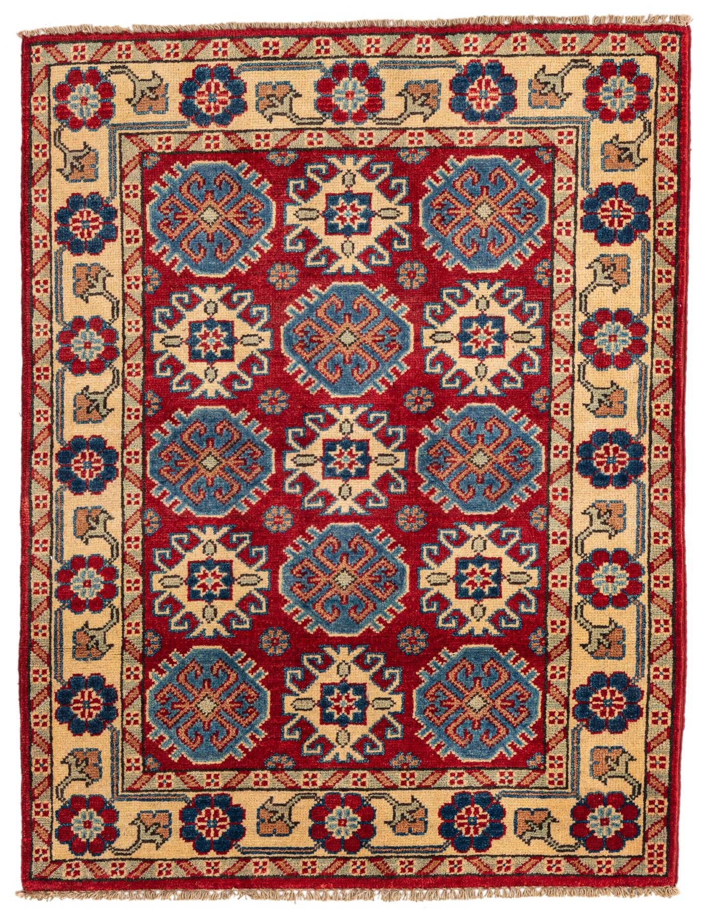 A 3x4 rectangular Rugs.com Kazak rug with a red field and a beige border, featuring traditional Southwestern and Oriental geometric patterns in blue, red, and cream.