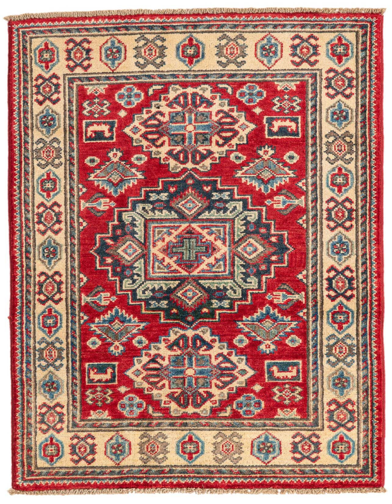 A 3x4 rectangular Rugs.com Kazak rug with a red field and a central medallion in blues, creams, and grays, surrounded by a cream border with geometric patterns.