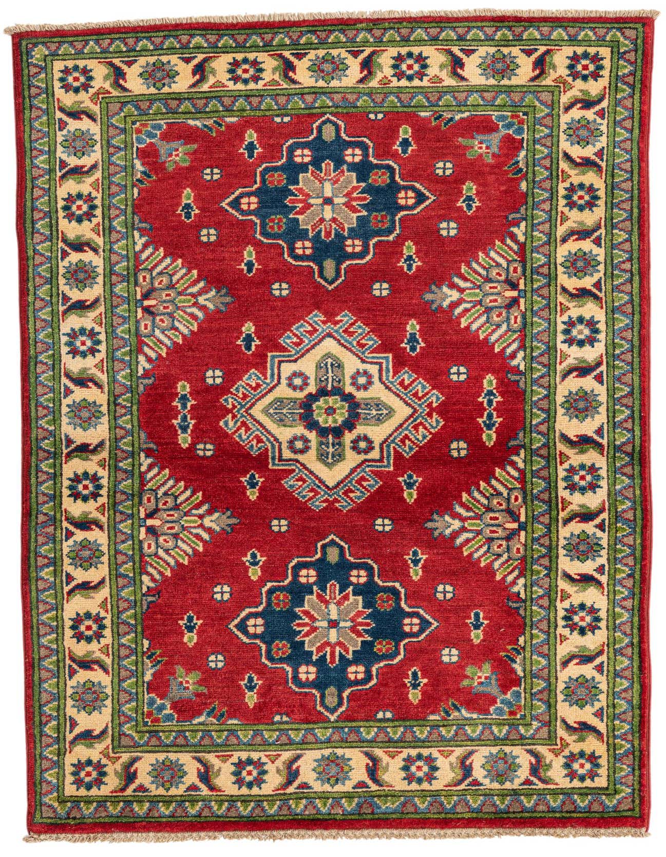 A 3x5 rectangular Rugs.com Kazak rug with a vibrant red field, intricate Southwestern and Oriental patterns, and a detailed cream and green border.