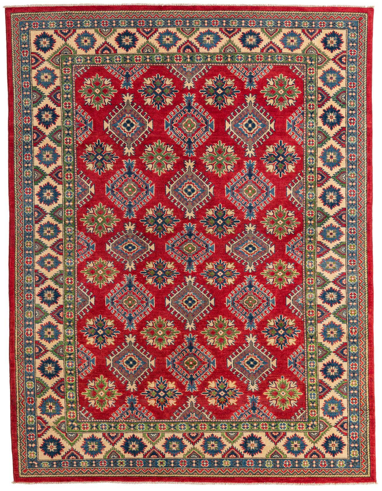 A 6x9 rectangular red area rug with traditional Southwestern floral and geometric patterns in blue, green, and beige.