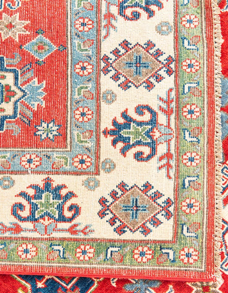 Detail image of  5' 5 x 8'  Hand Knotted Kazak Rug