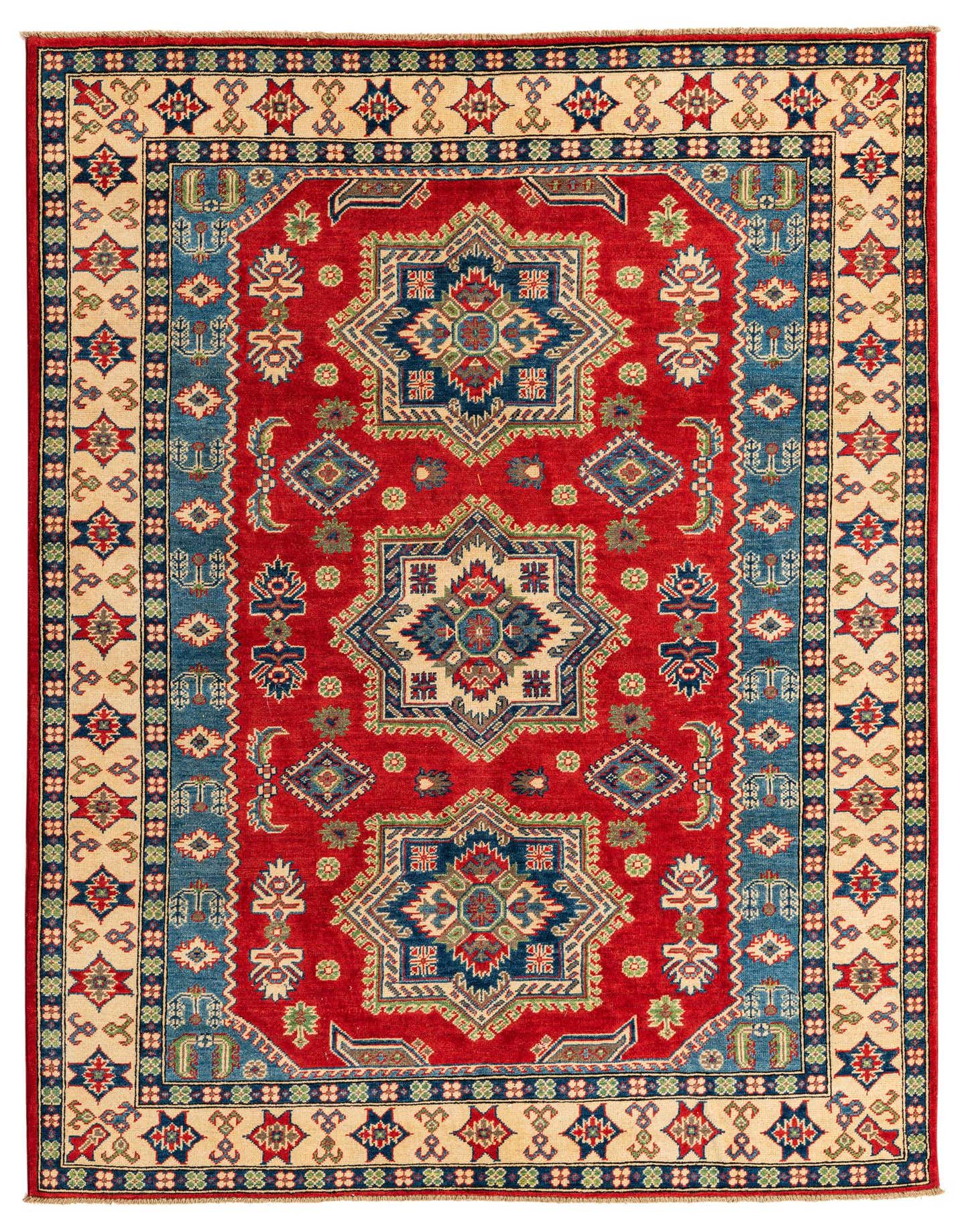 A 6x9 rectangular red traditional rug with a large central medallion and intricate blue, beige, and green patterns, suitable for a living room.
