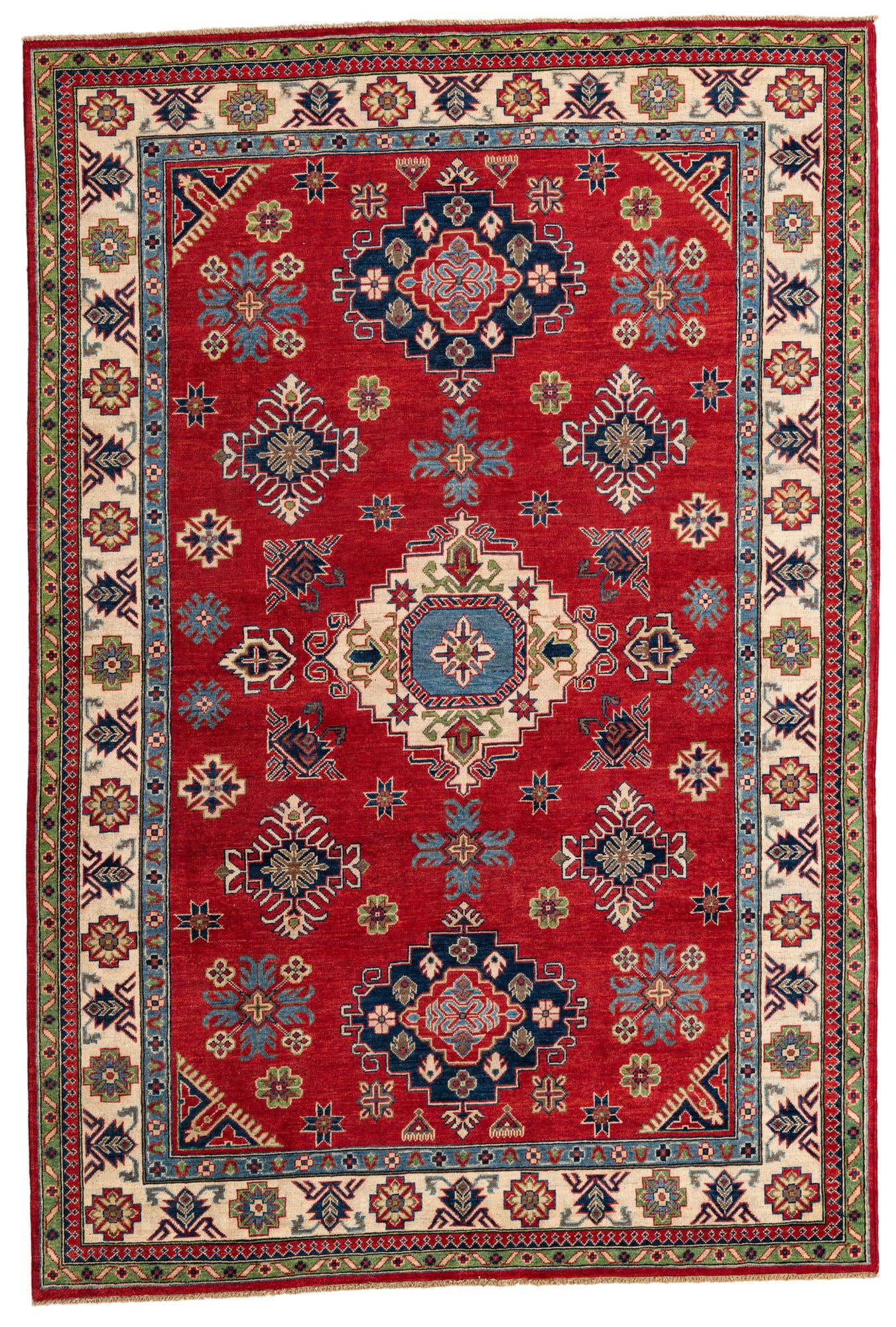 A 7x10 rectangular red area rug with a traditional Southwestern medallion pattern and intricate borders.