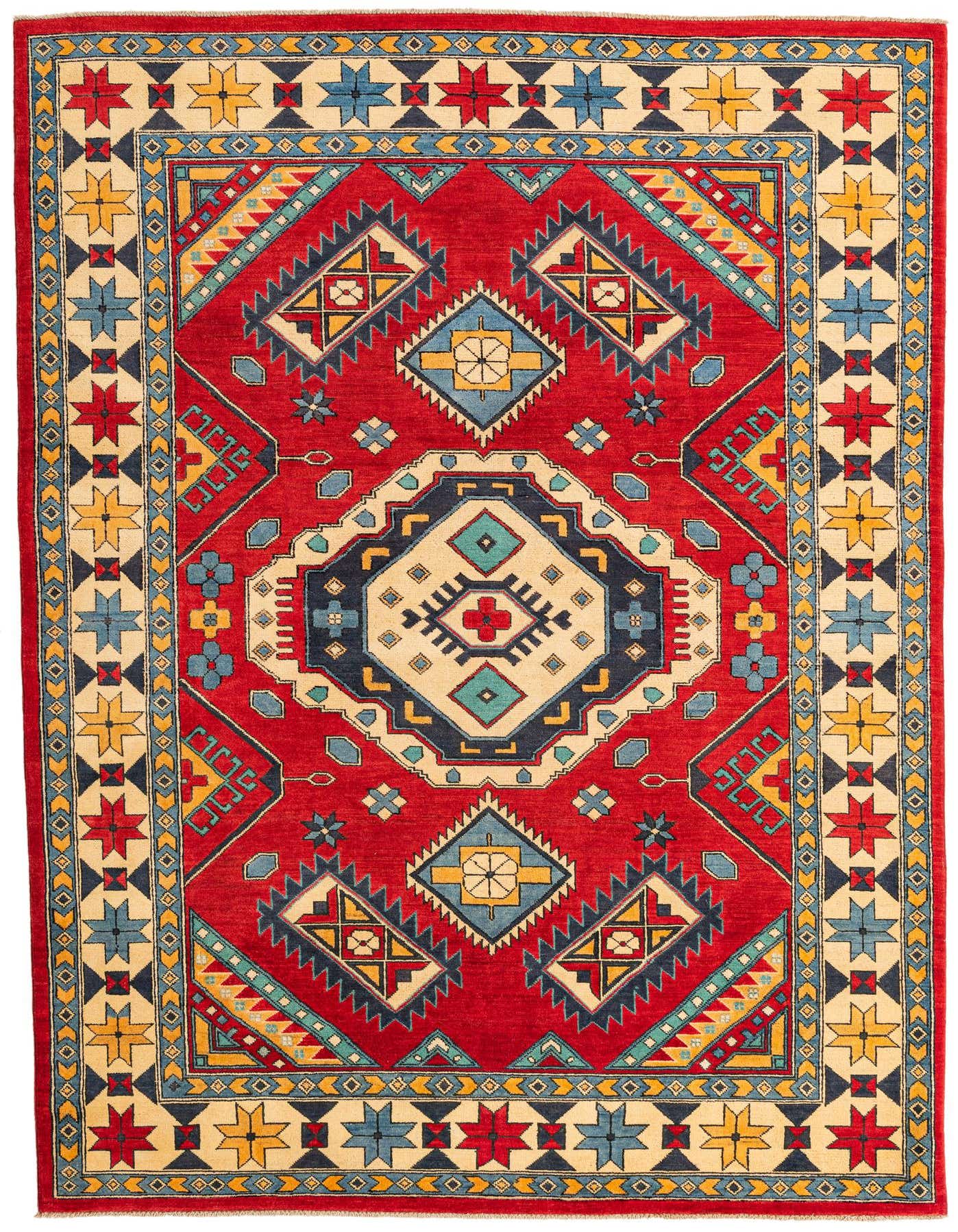 A 7x10 rectangular red area rug featuring a central medallion and geometric patterns in blue, yellow, and cream.