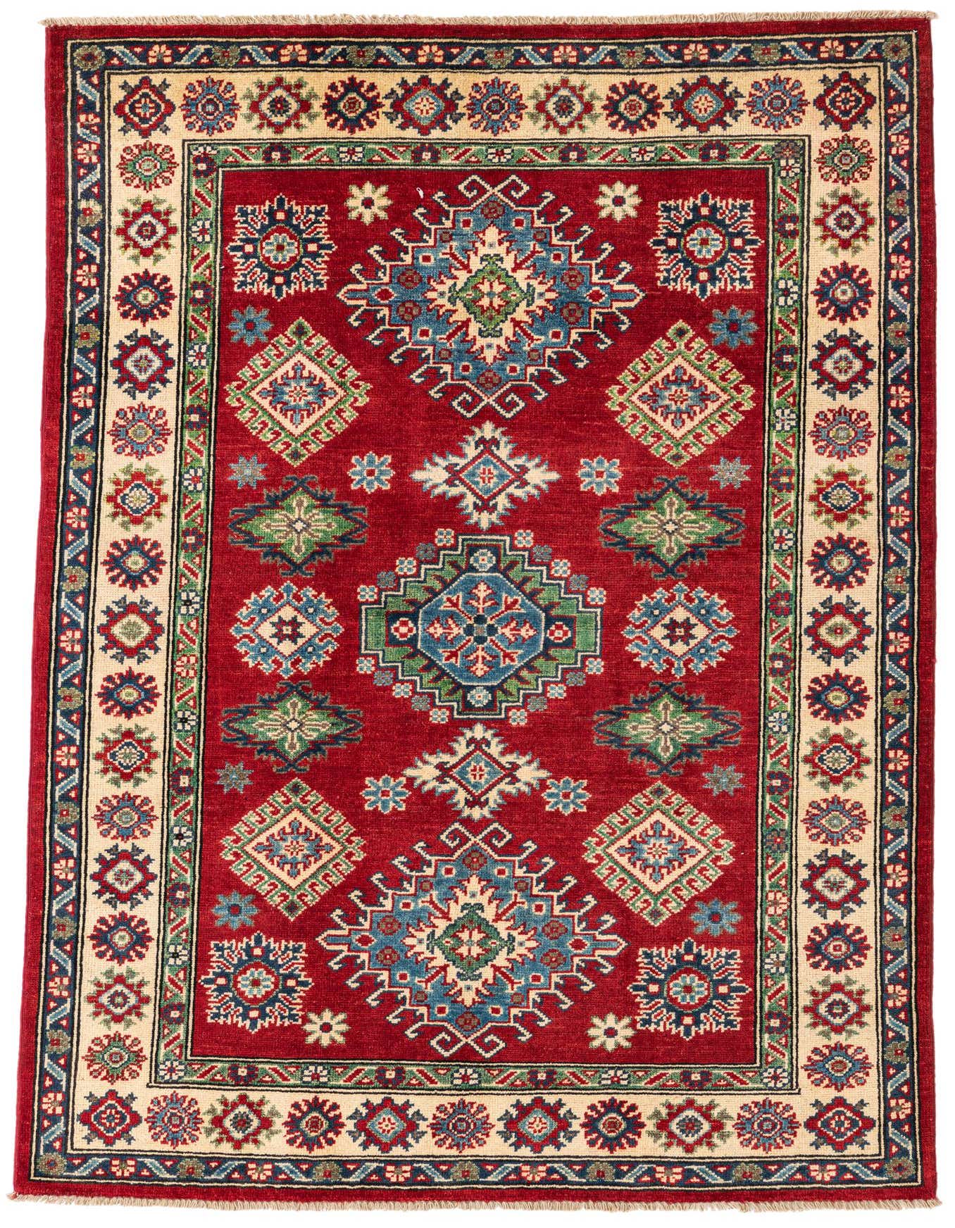 A 4x6 rectangular red wool rug with a traditional Southwestern medallion pattern and a cream border, suitable for a living room.